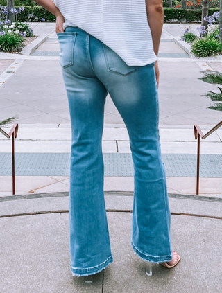 Plus Size High Rise Light Distressed Button Fly Flare Jeans